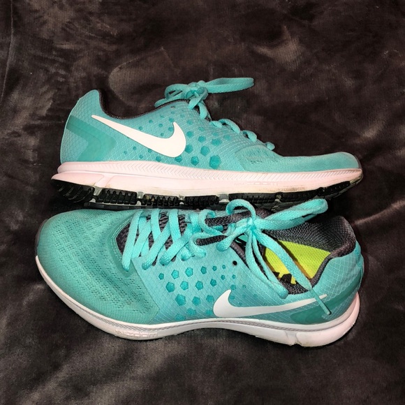 teal colored tennis shoes